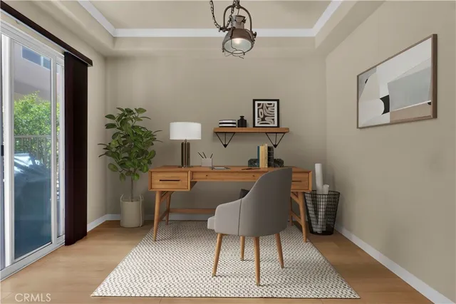 a workspace with furniture and window