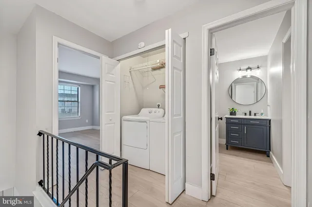 a view of a bathroom from the hallway