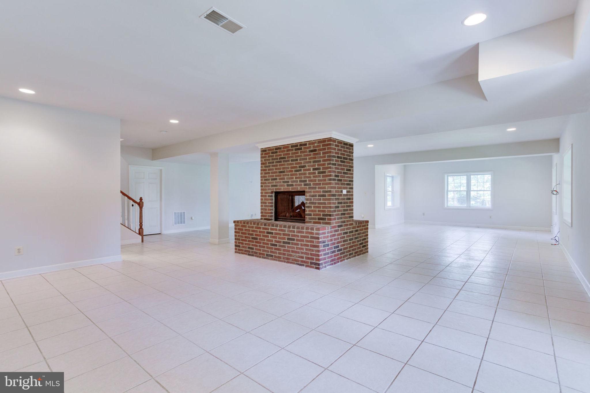1843 Hunter Mill Road Vienna, VA 22182 - Photo 63 of 78 Dual fireplace with ample room for entertaining
