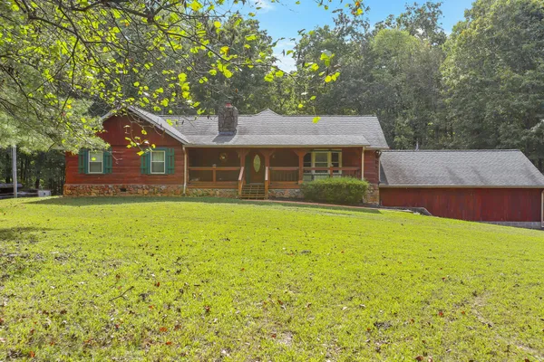 front view of house with a yard