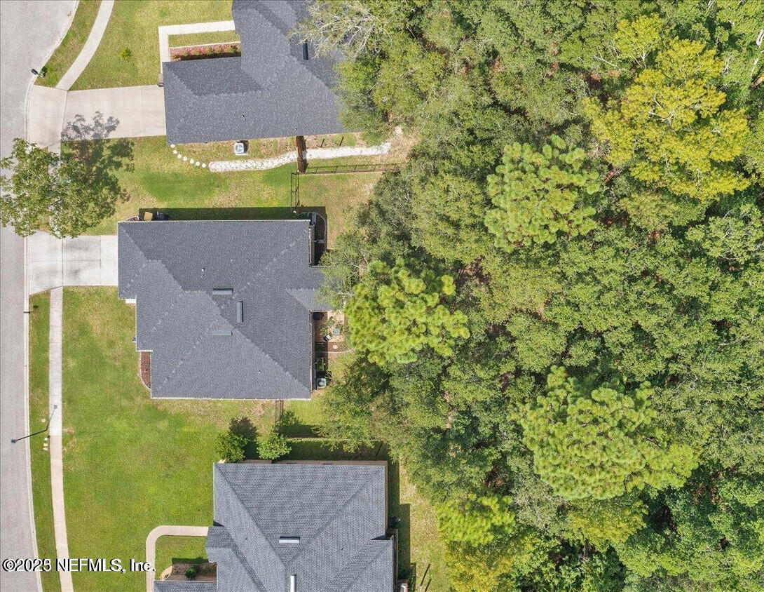 5573 Casavedra Court Jacksonville, FL 32244 - Photo 29 of 34 an aerial view of a house with a yard
