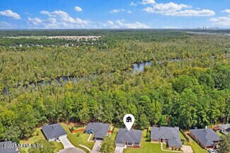 5573 Casavedra Court Jacksonville, FL 32244 - Photo 30 of 34 a view of a city from a terrace