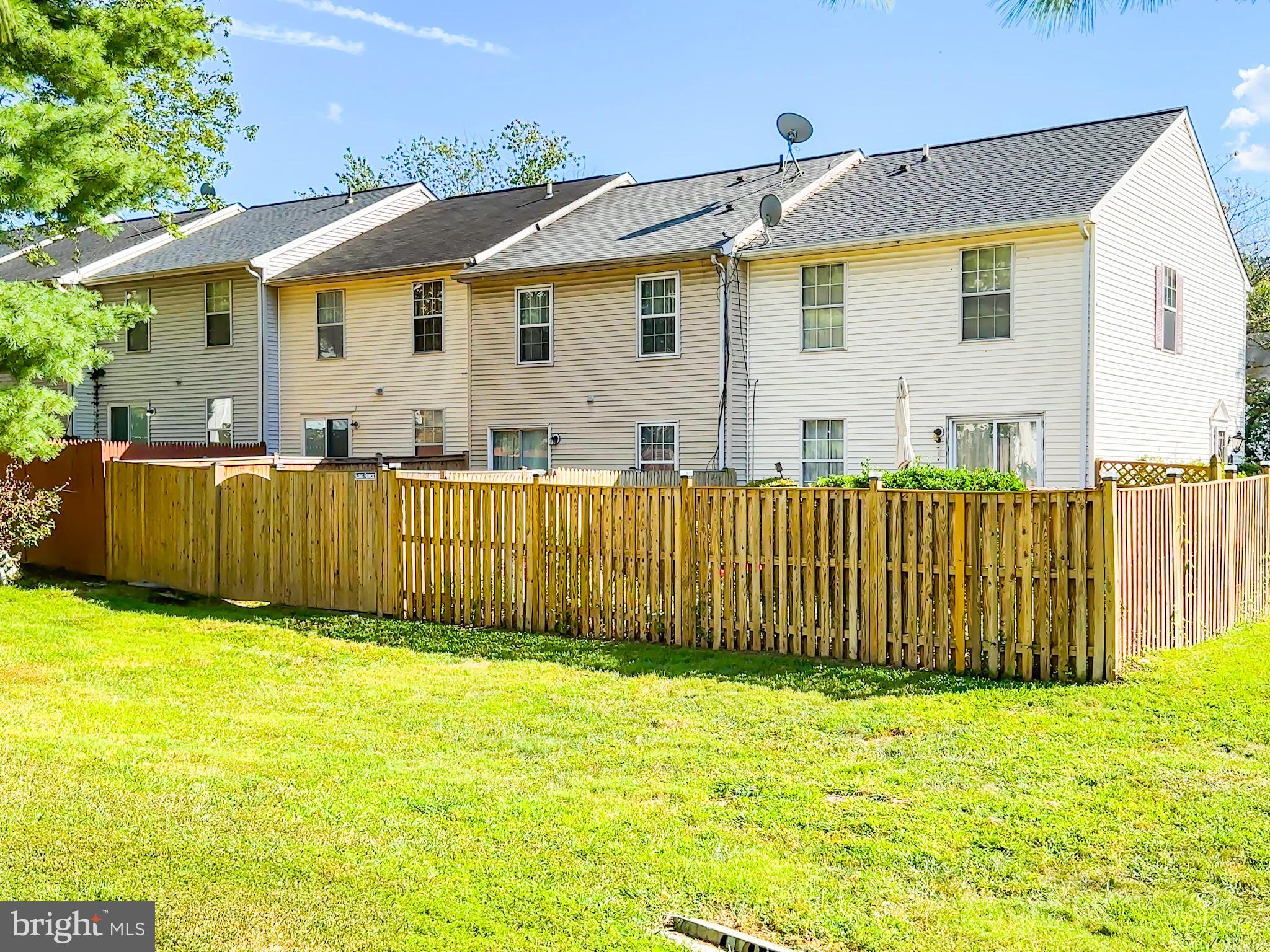 8578 Ritchboro Road District Heights, MD 20747 - Photo 30 of 31 a view of a house with a backyard