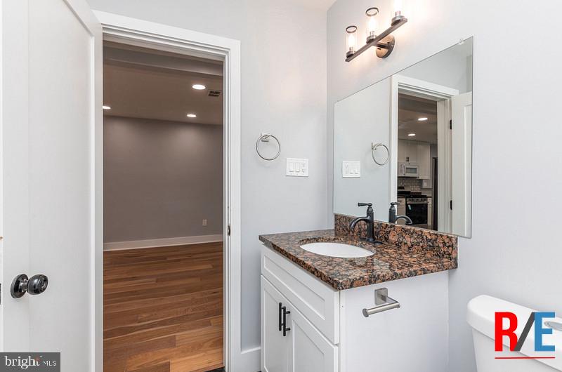 4100 Queensbury Road Hyattsville, MD 20781 - Photo 19 of 24 Modern bathroom with sleek finishes.