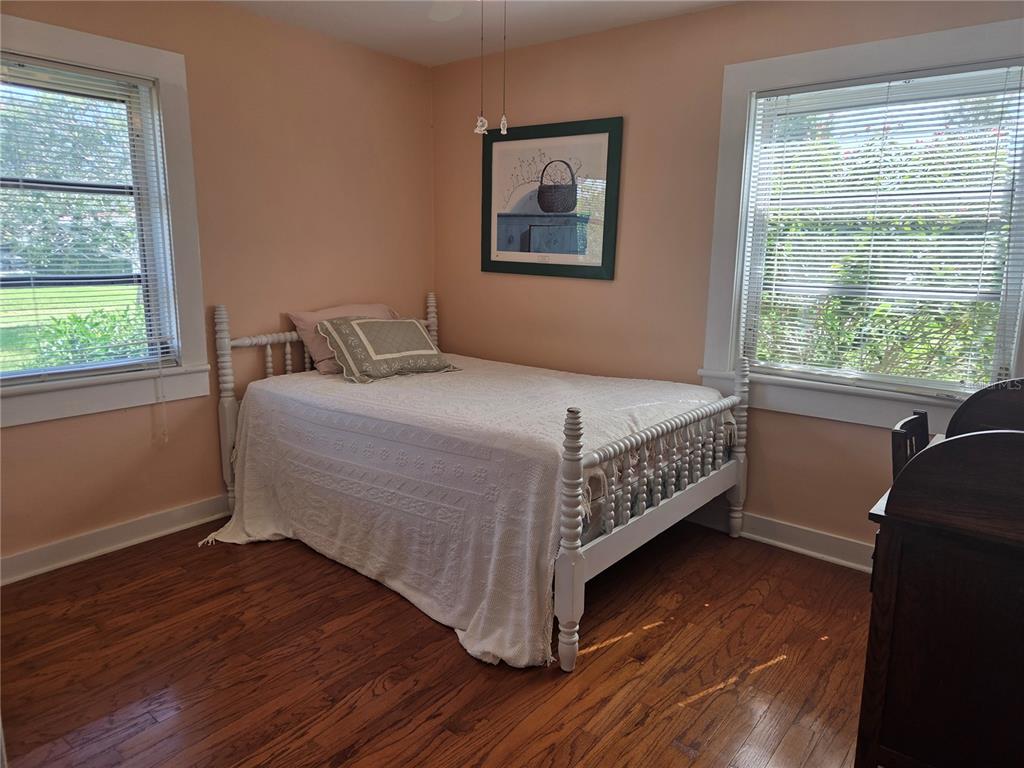 7 Wisconsin Avenue St. Cloud, FL 34769 - Photo 10 of 18 a bedroom with a bed and window