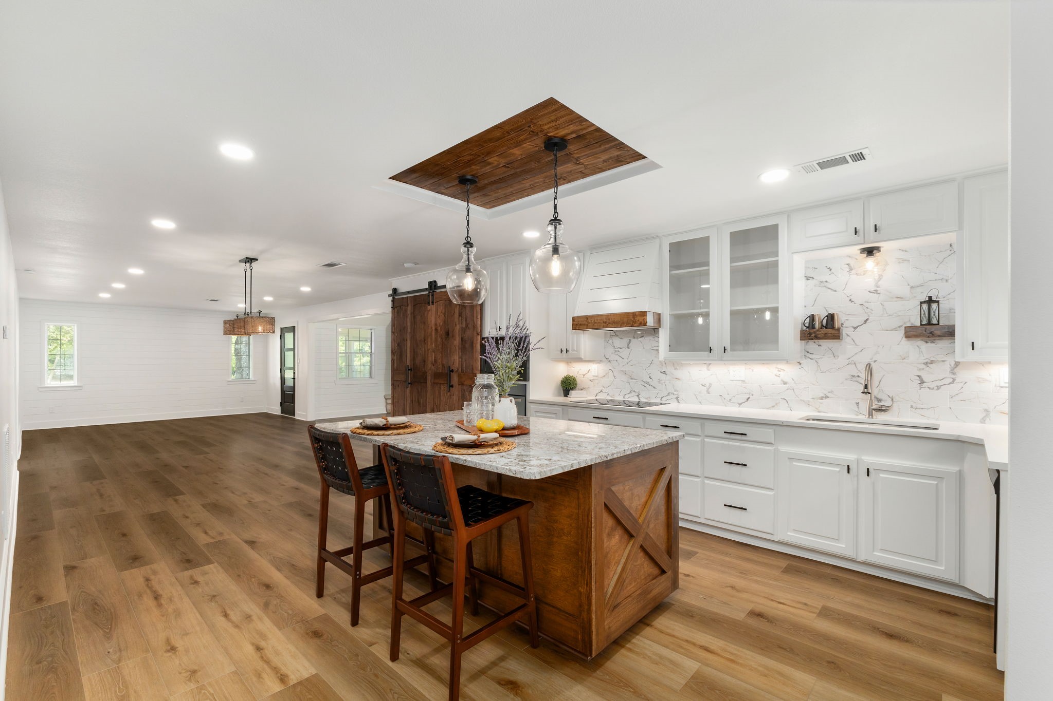 1195 Track Road New Ulm, TX 78950 - Photo 12 of 49 a kitchen with a table and chairs in it