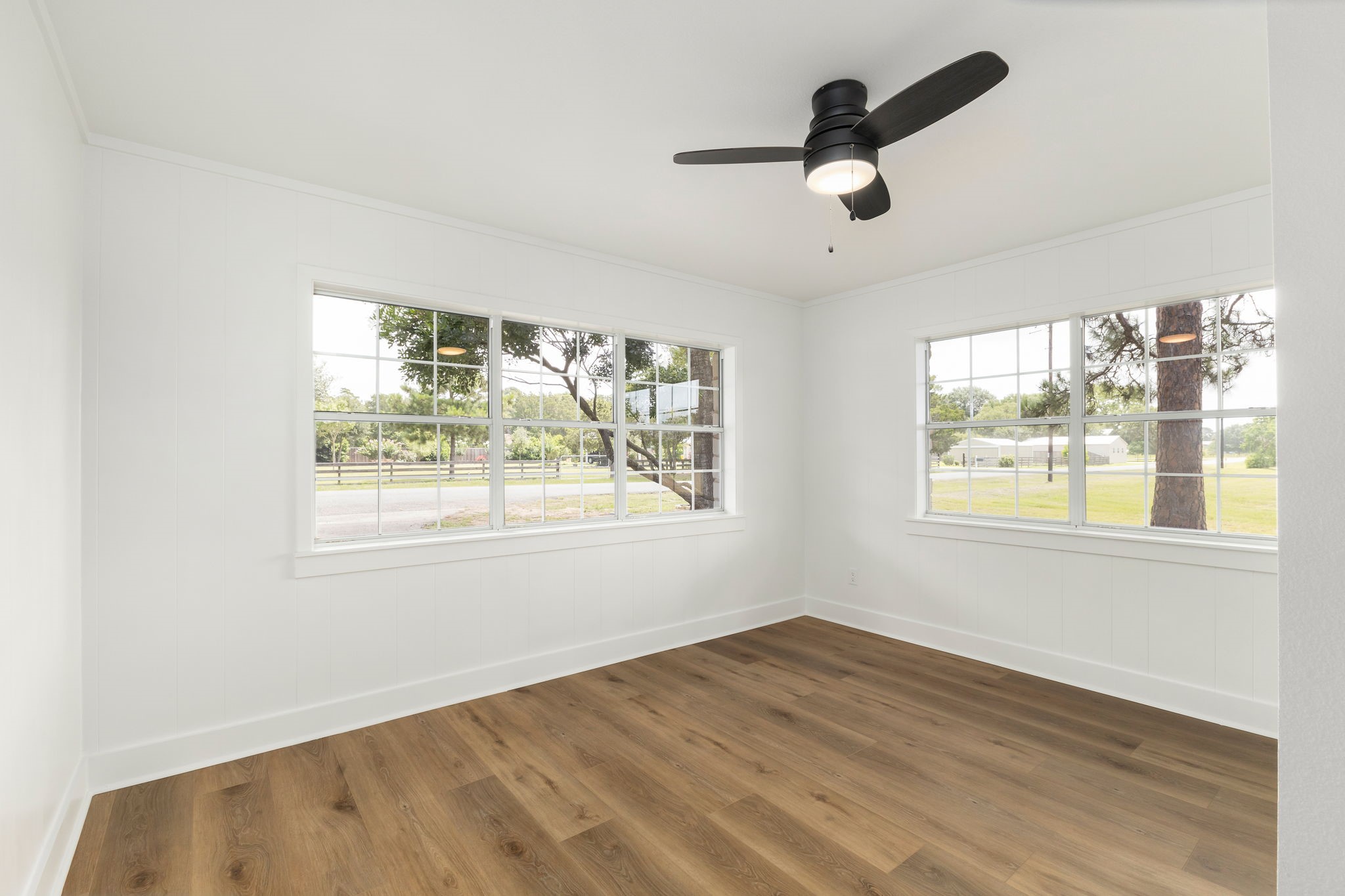 1195 Track Road New Ulm, TX 78950 - Photo 29 of 49 a view of empty room with wooden floor and window