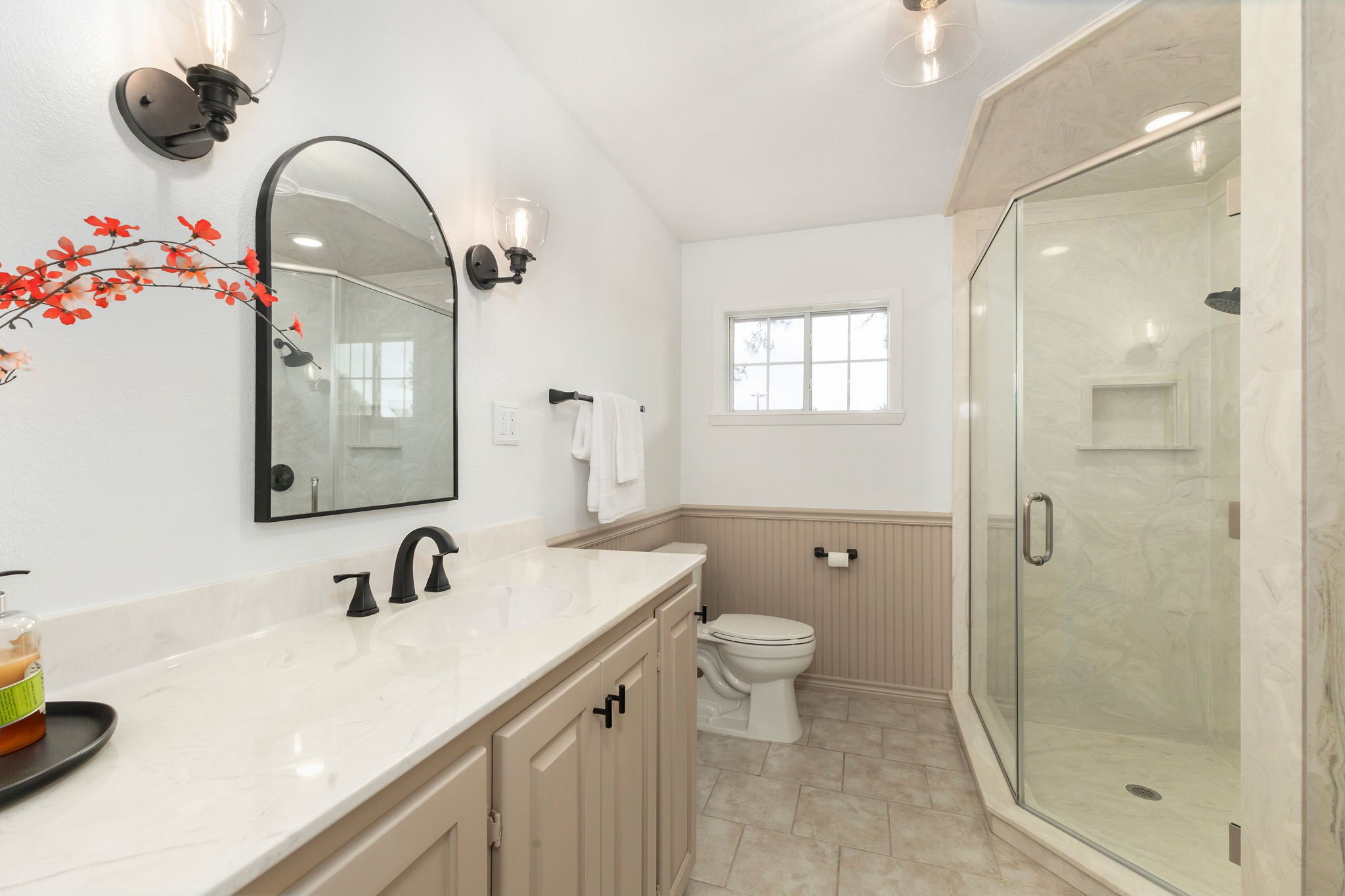 1195 Track Road New Ulm, TX 78950 - Photo 31 of 49 Elegant full bathroom featuring a spacious glass shower, modern fixtures, and stylish vanity for a luxury touch.