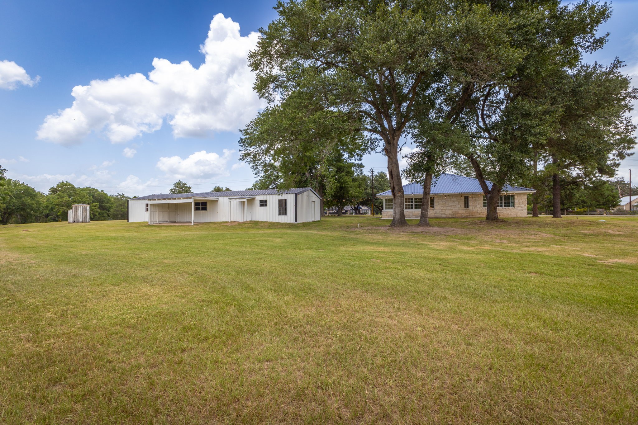 1195 Track Road New Ulm, TX 78950 - Photo 38 of 49 a view of a house with a big yard