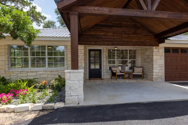 a house with a bench in front of it