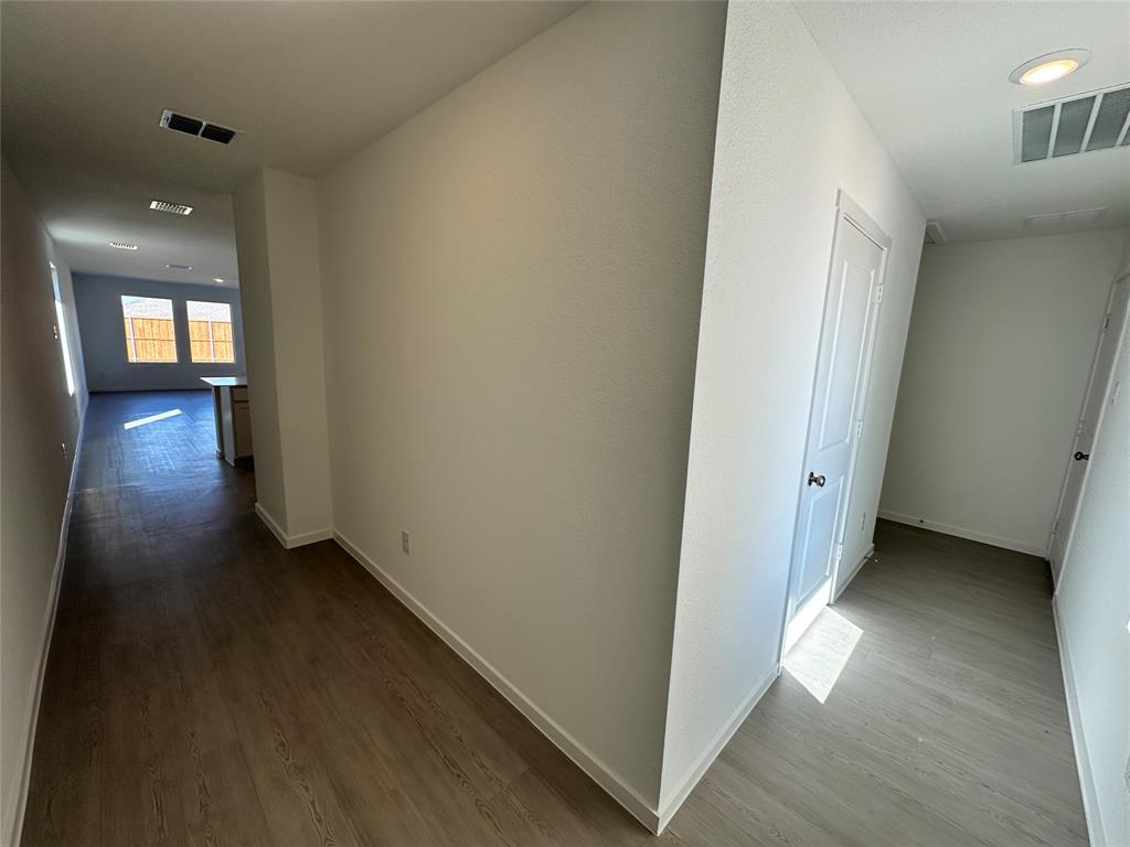 1613 Elliott Road Howe, TX 75459 - Photo 5 of 13 a view of hallway with wooden floor