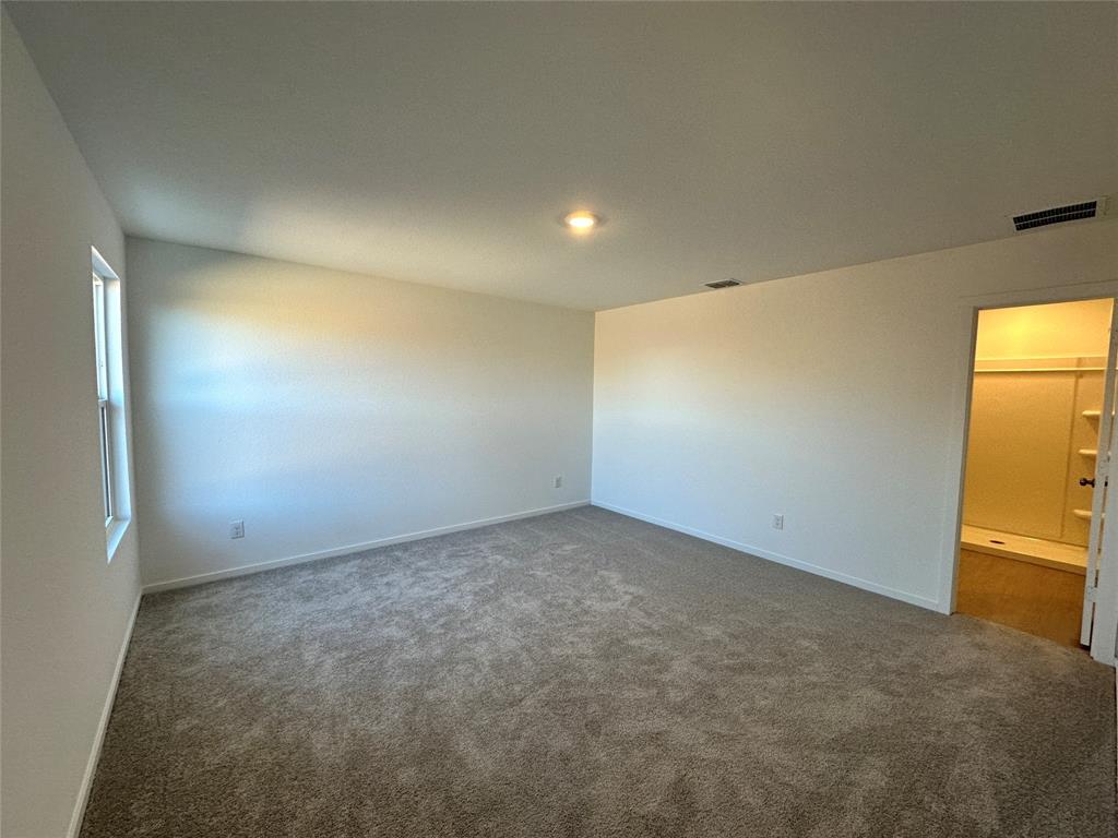 1613 Elliott Road Howe, TX 75459 - Photo 7 of 13 an empty room with windows
