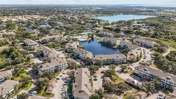 an aerial view of a city with lots of residential buildings