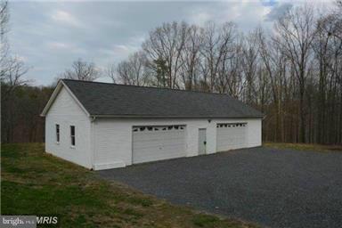 Detached 4 bay garage and attached workshop