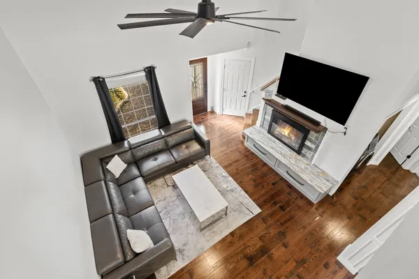 a view of living room with furniture and a window