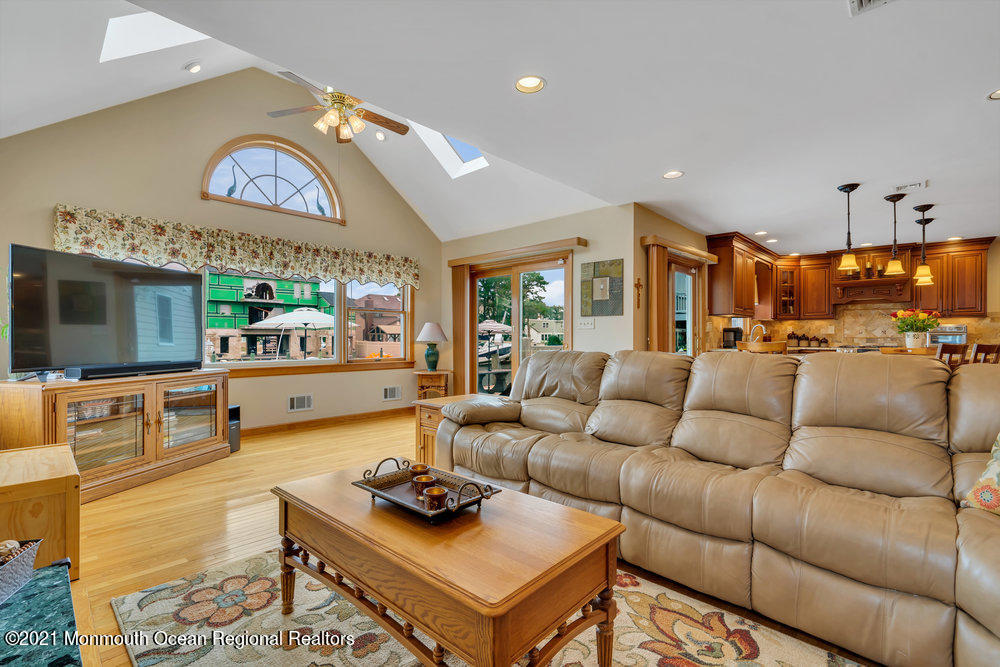 37 Channel Road Toms River, NJ 08753 - Photo 22 of 57 a living room with furniture and a flat screen tv