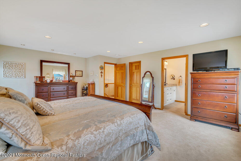 37 Channel Road Toms River, NJ 08753 - Photo 34 of 57 a bedroom with a bed and a television