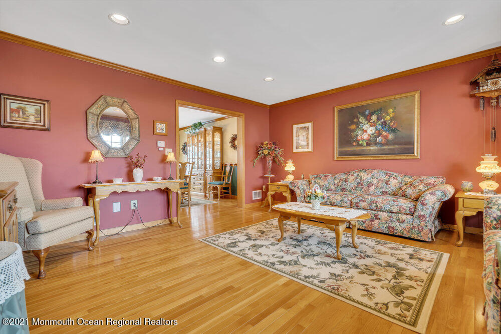 37 Channel Road Toms River, NJ 08753 - Photo 7 of 57 a living room with furniture and a rug