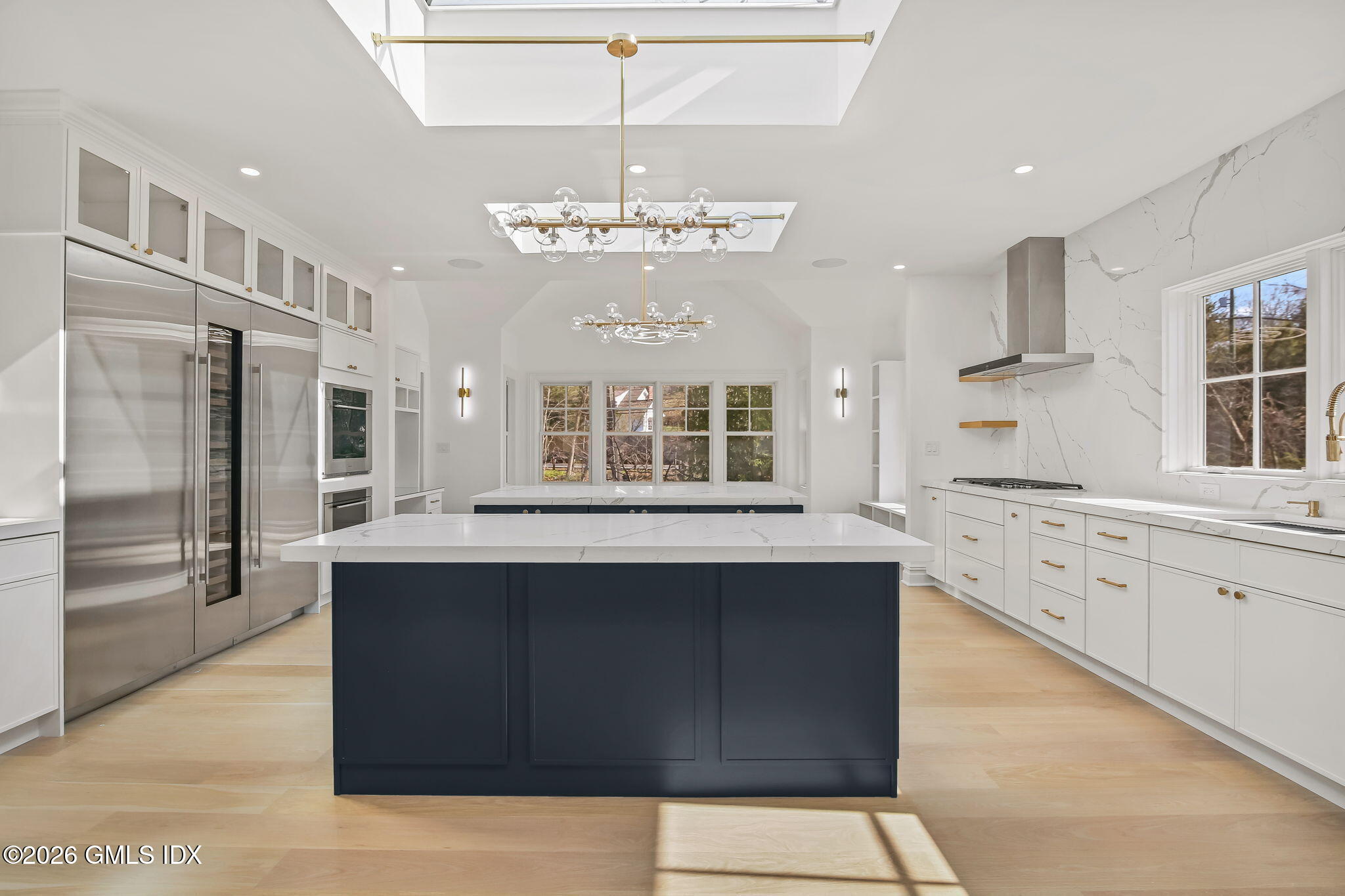 7 Bailiwick Road Greenwich, CT 06831 - Photo 14 of 42 a large kitchen with cabinets and wooden floor