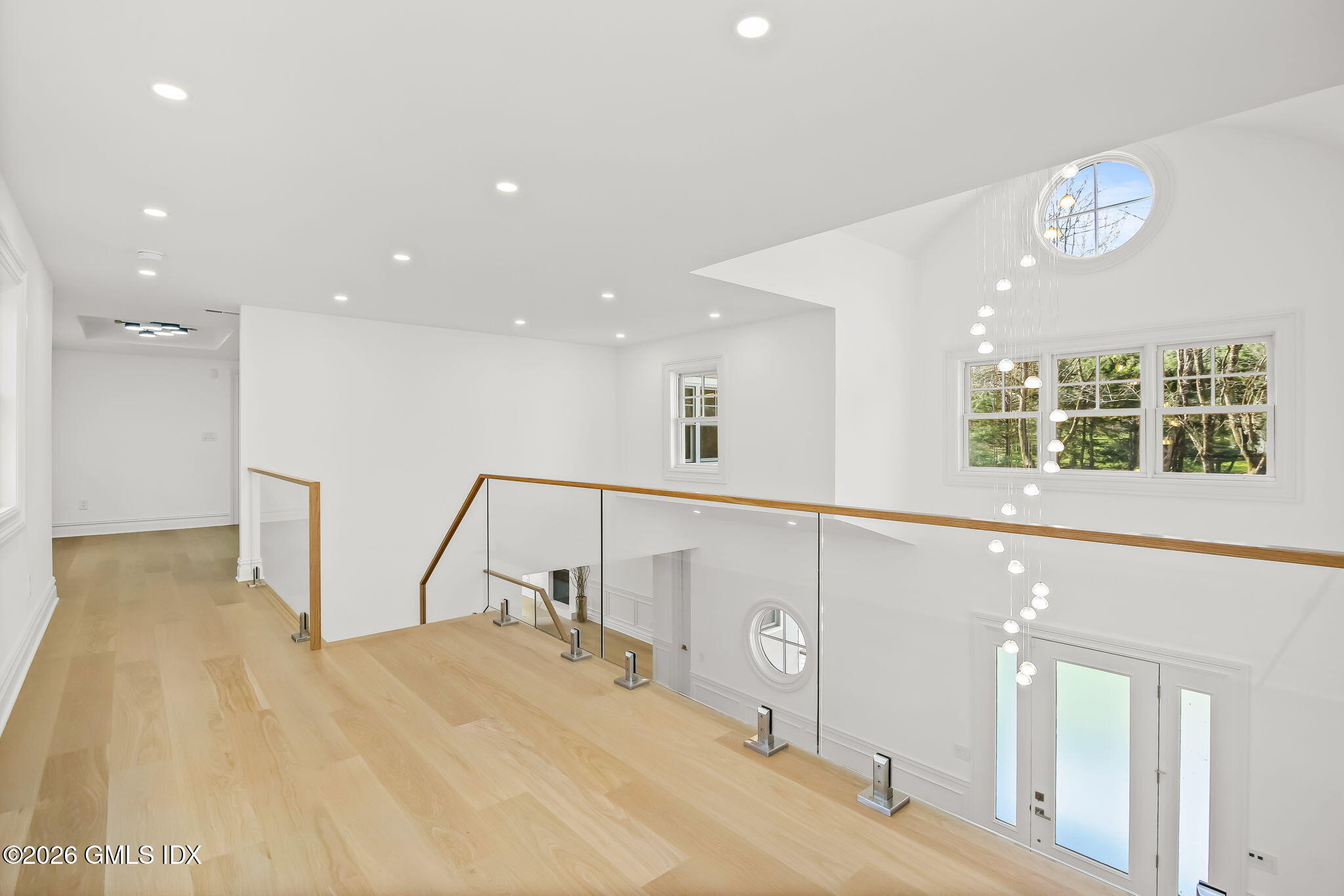 7 Bailiwick Road Greenwich, CT 06831 - Photo 18 of 42 a view of a hallway with windows