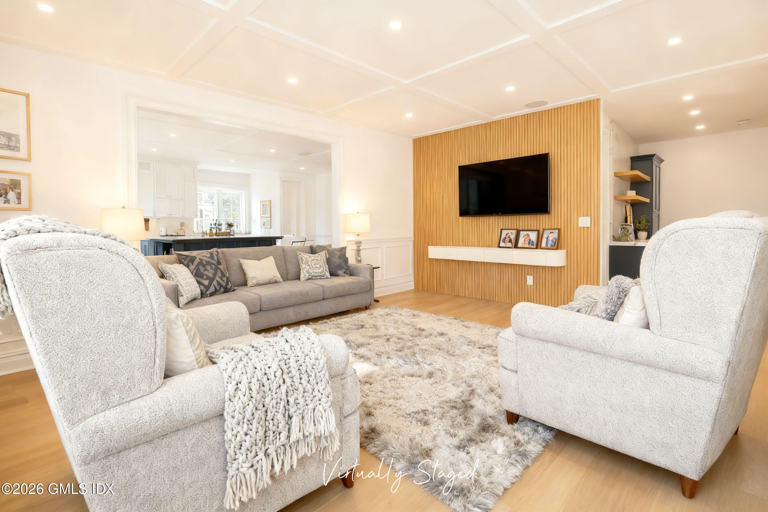 7 Bailiwick Road Greenwich, CT 06831 - Photo 21 of 42 a living room with furniture and a flat screen tv