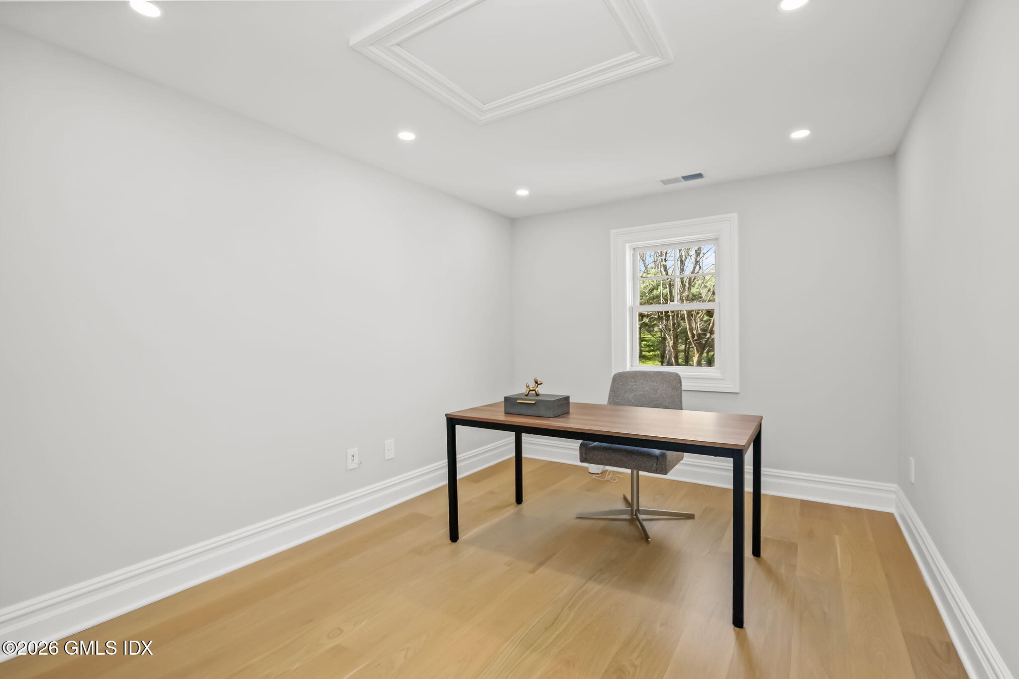 7 Bailiwick Road Greenwich, CT 06831 - Photo 26 of 42 a view of a workspace with a window