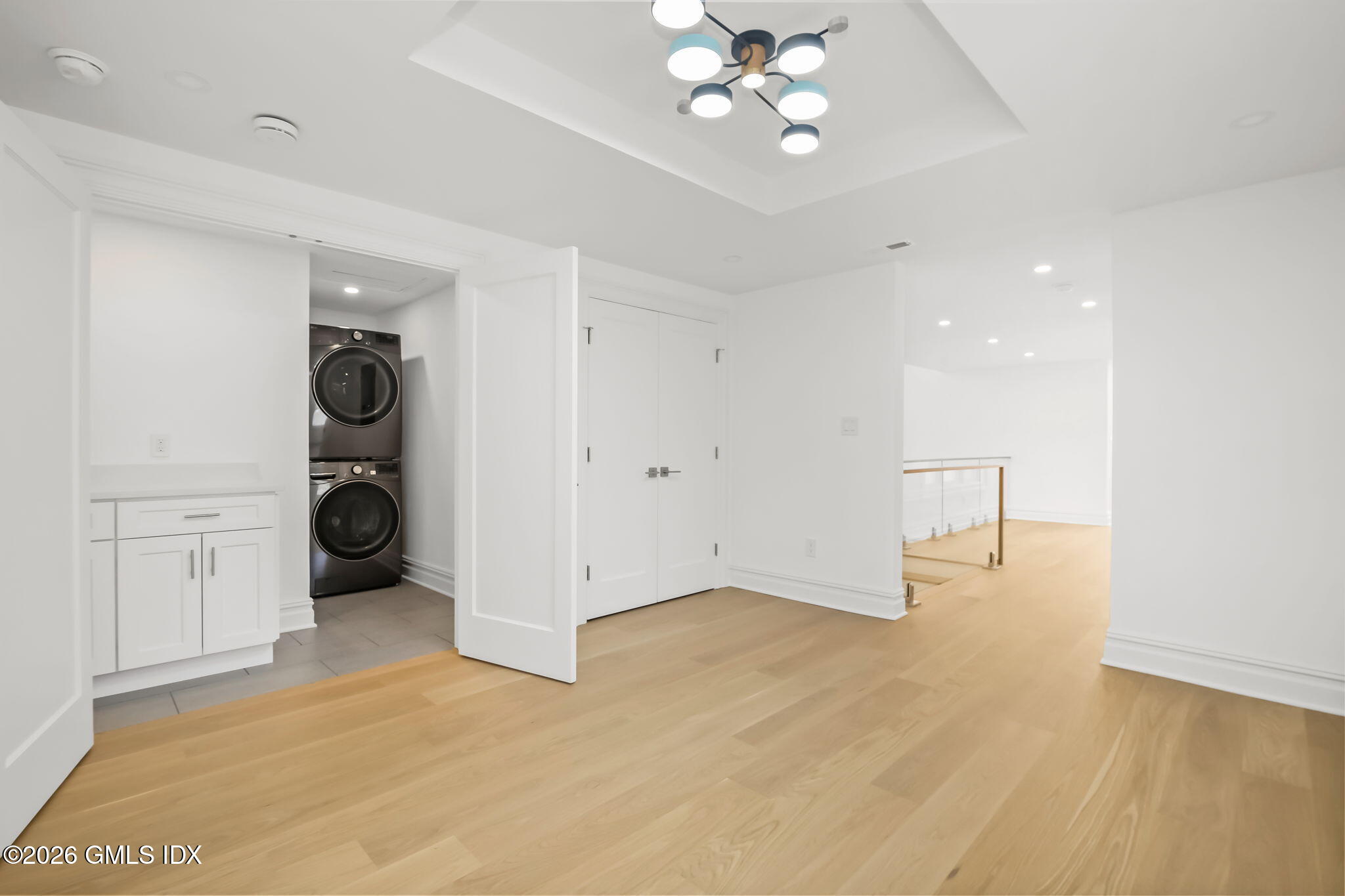 7 Bailiwick Road Greenwich, CT 06831 - Photo 27 of 42 wooden floor in an empty room with a window