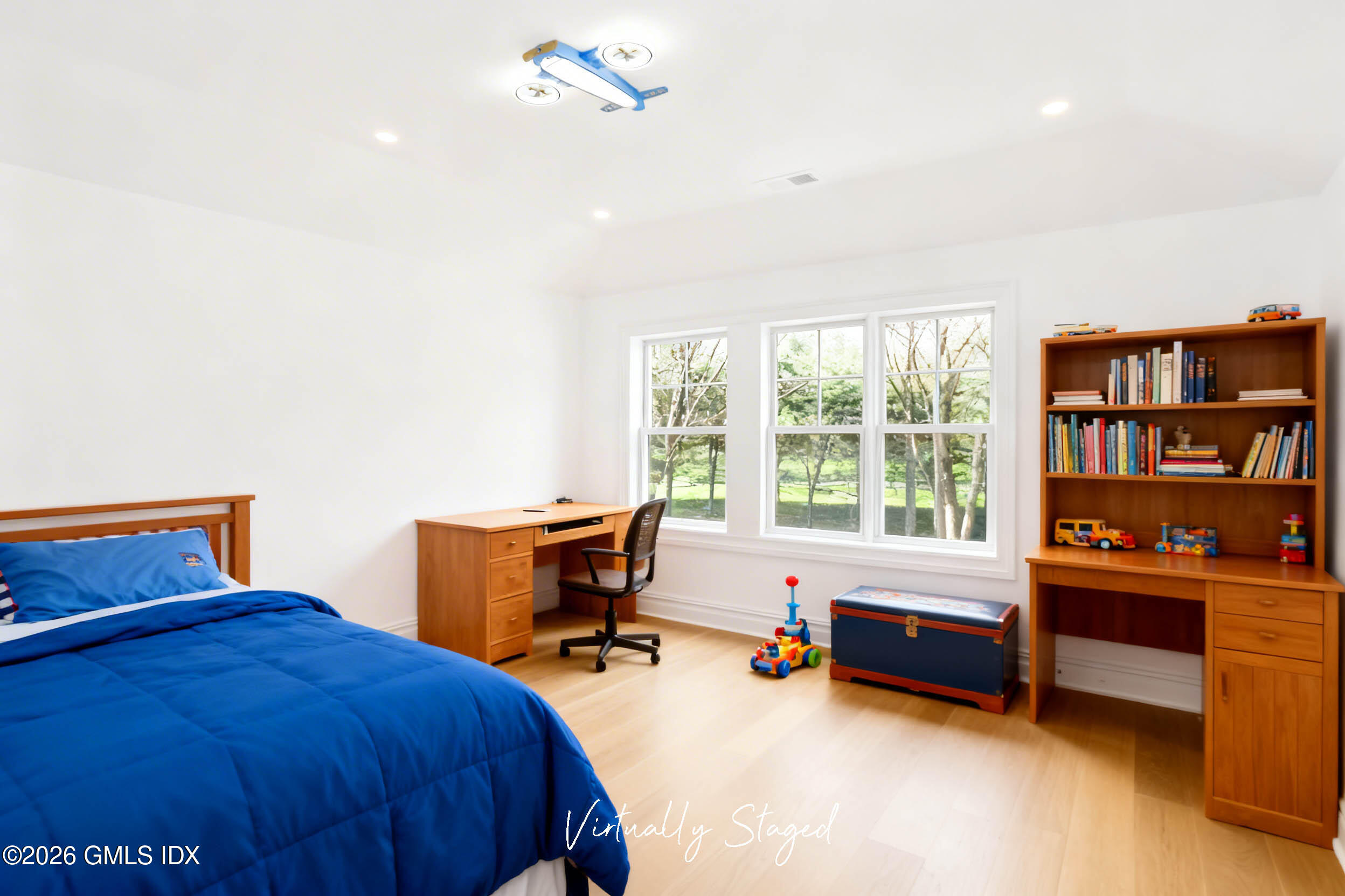 7 Bailiwick Road Greenwich, CT 06831 - Photo 32 of 42 a bedroom with furniture and a bed