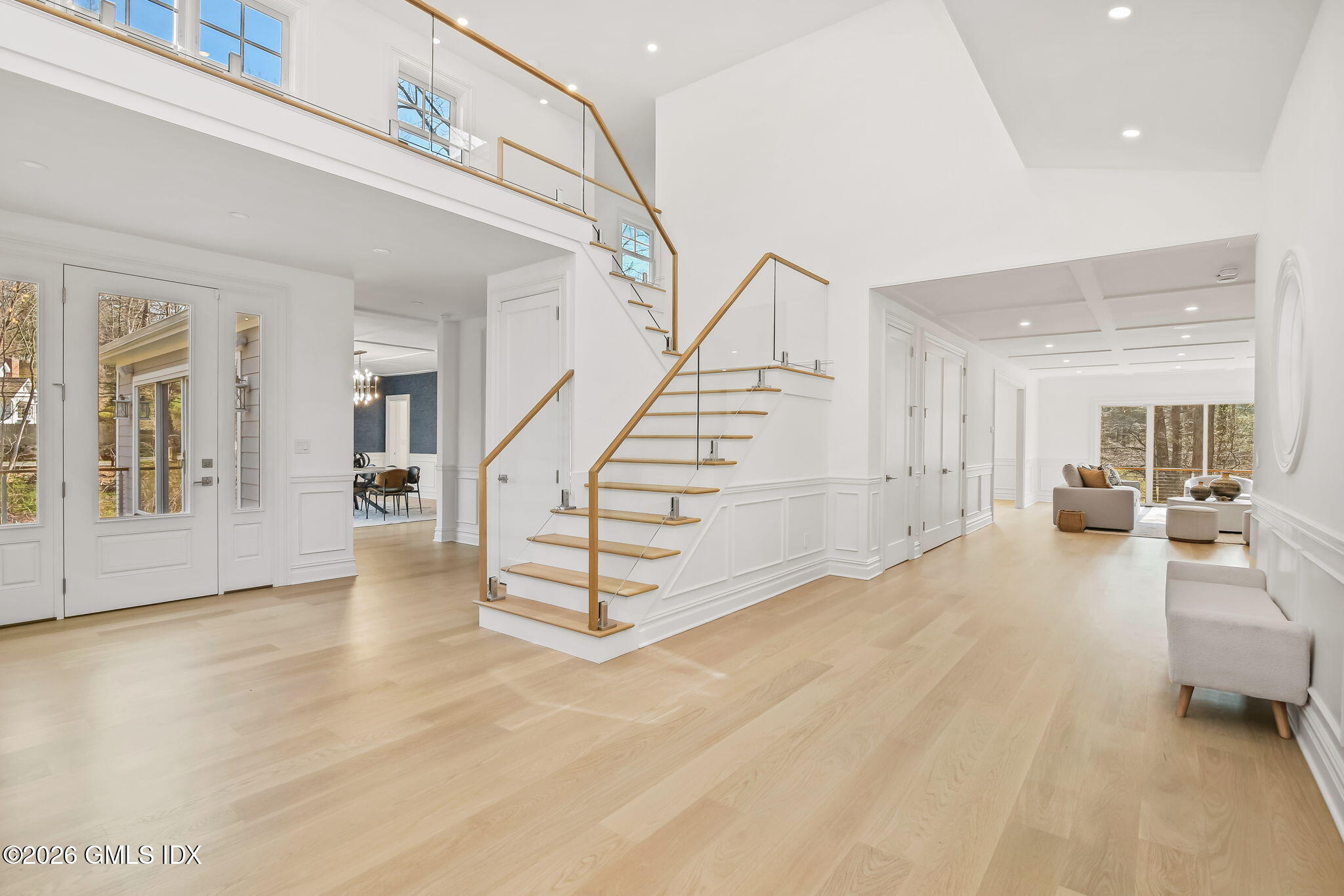 7 Bailiwick Road Greenwich, CT 06831 - Photo 5 of 42 a view of a livingroom with furniture and stairs