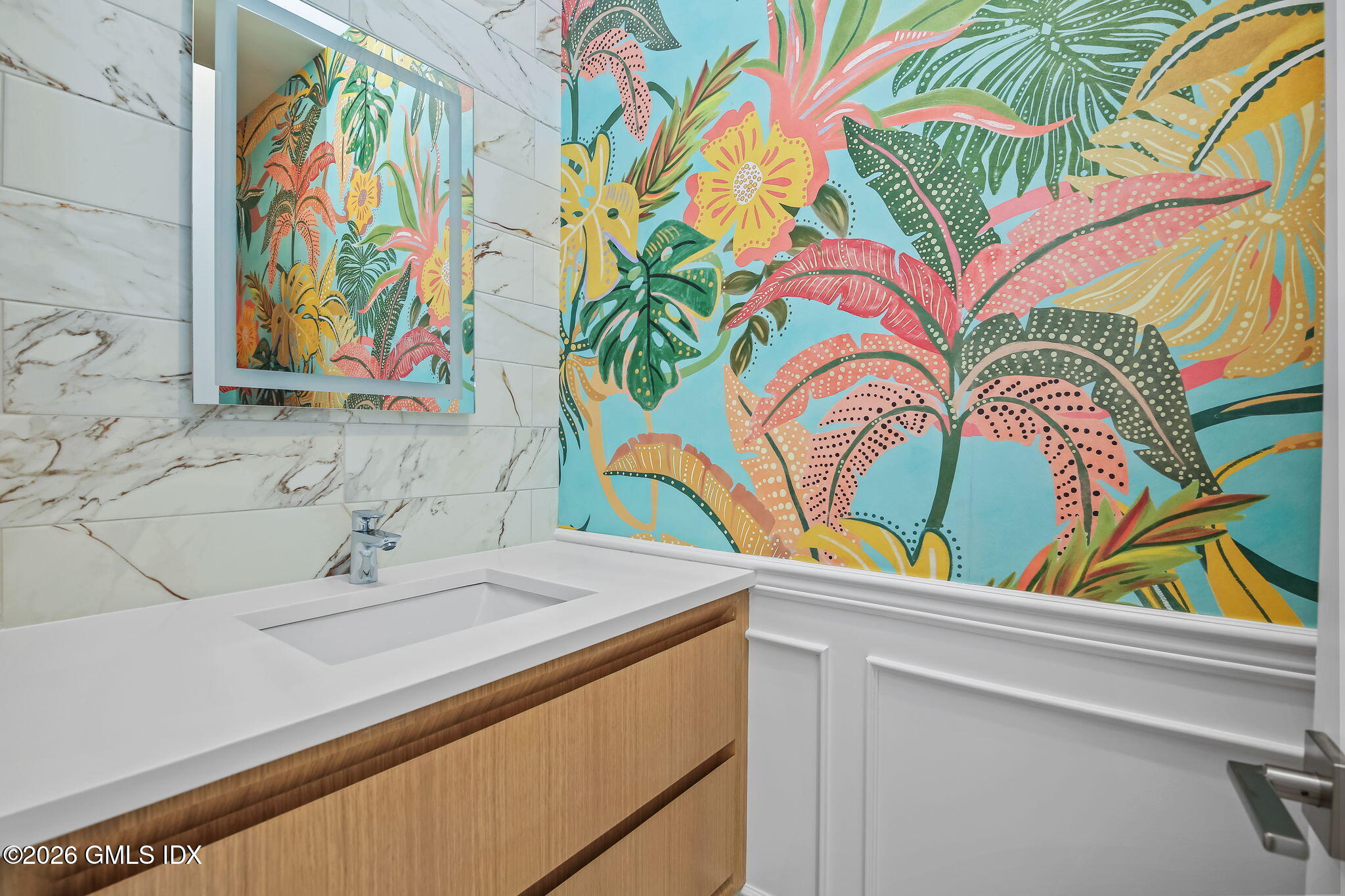 7 Bailiwick Road Greenwich, CT 06831 - Photo 8 of 42 a bathroom with a sink and a mirror