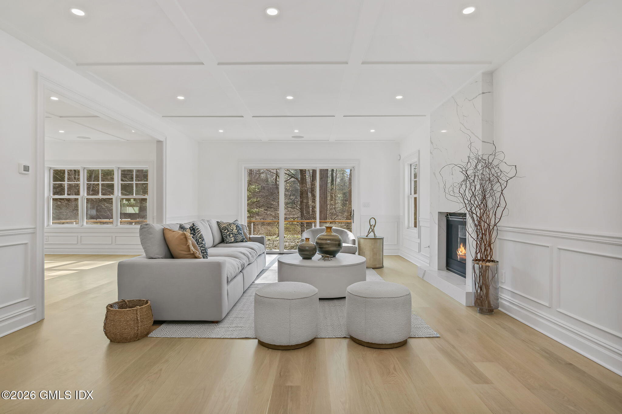 7 Bailiwick Road Greenwich, CT 06831 - Photo 10 of 42 a living room with fireplace furniture and a large window