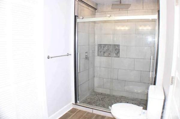 a bathroom with a sink vanity and a mirror