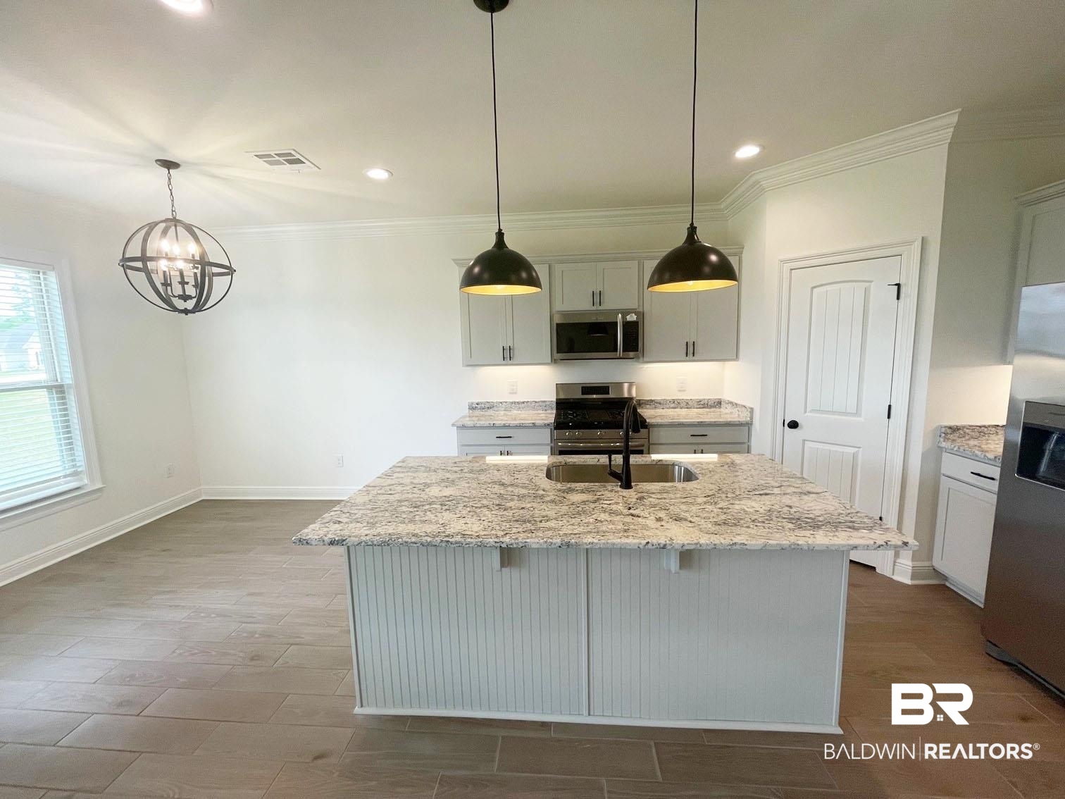 1339 Fenton Circle Foley, AL 36535 - Photo 2 of 17 Kitchen featuring recessed lighting, visible vents, light stone counters, and stainless steel appliances
