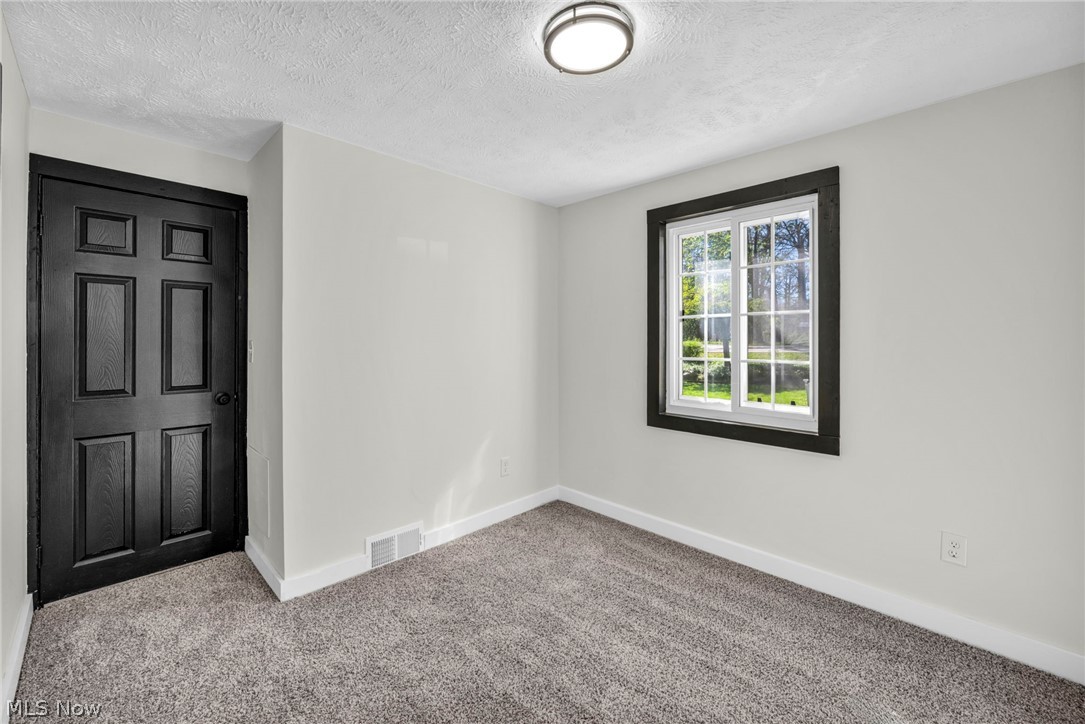7339 River Road Olmsted Falls, OH 44138 - Photo 29 of 45 White interior walls featuring contrasting dark trim