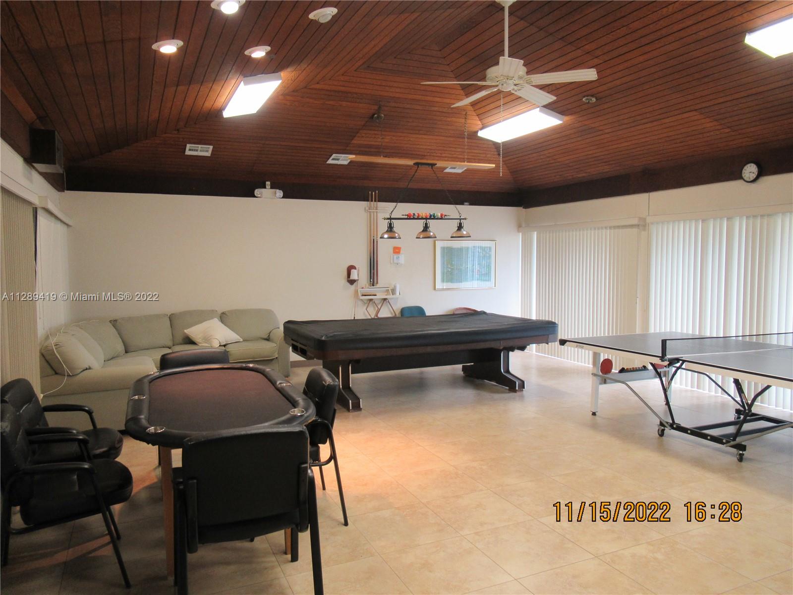 8311 South Street Boca Raton, FL 33433 - Photo 39 of 40 a living room with furniture and a pool table