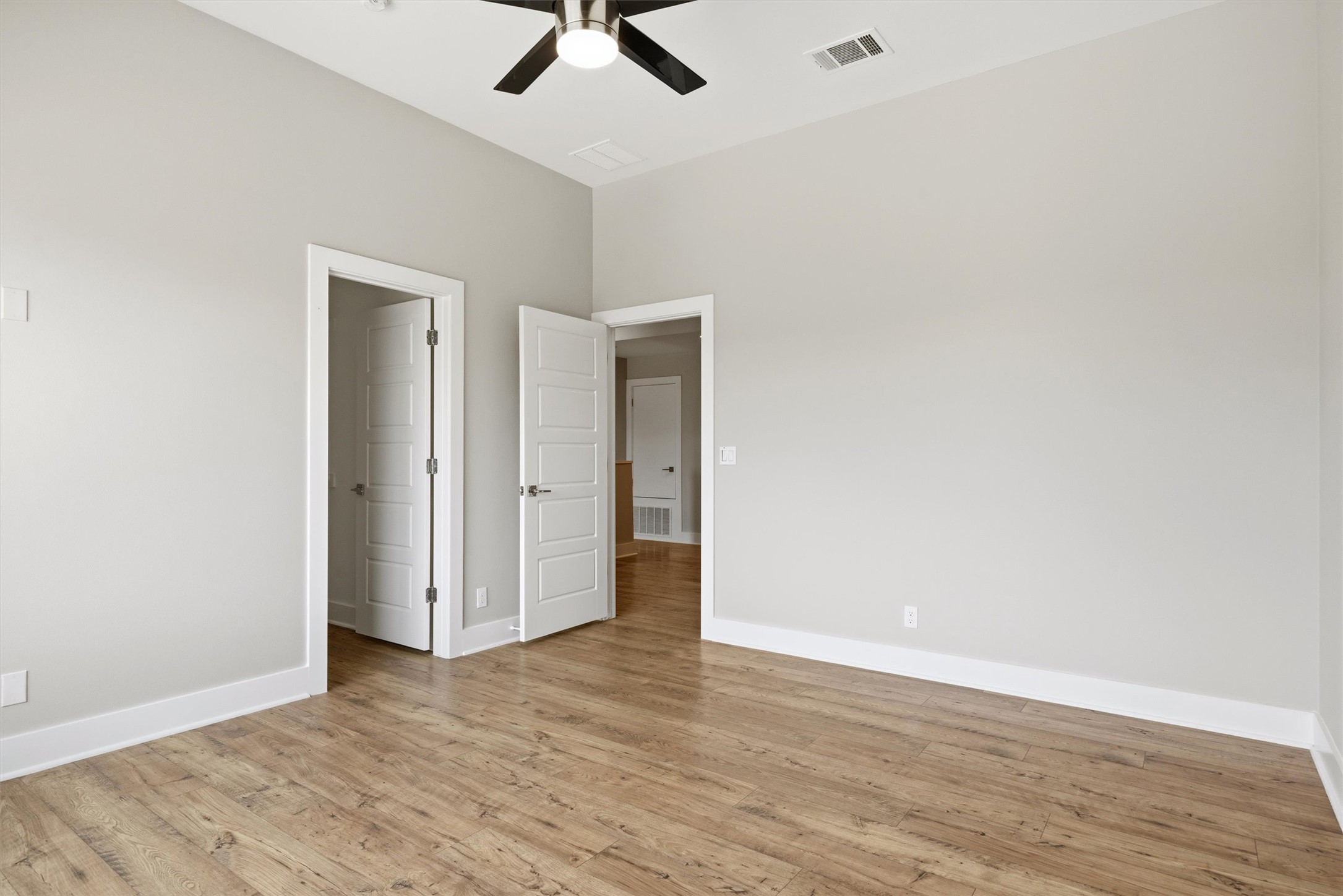 1210 Stobaugh Street, Unit B Austin, TX 78757 - Photo 12 of 40 A quiet retreat with durable flooring and modern details awaits your personal touch.