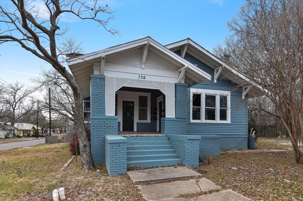 738 1st Street Southwest Paris, TX 75460 - Photo 2 of 25 View of front of home featuring a porch and brick siding