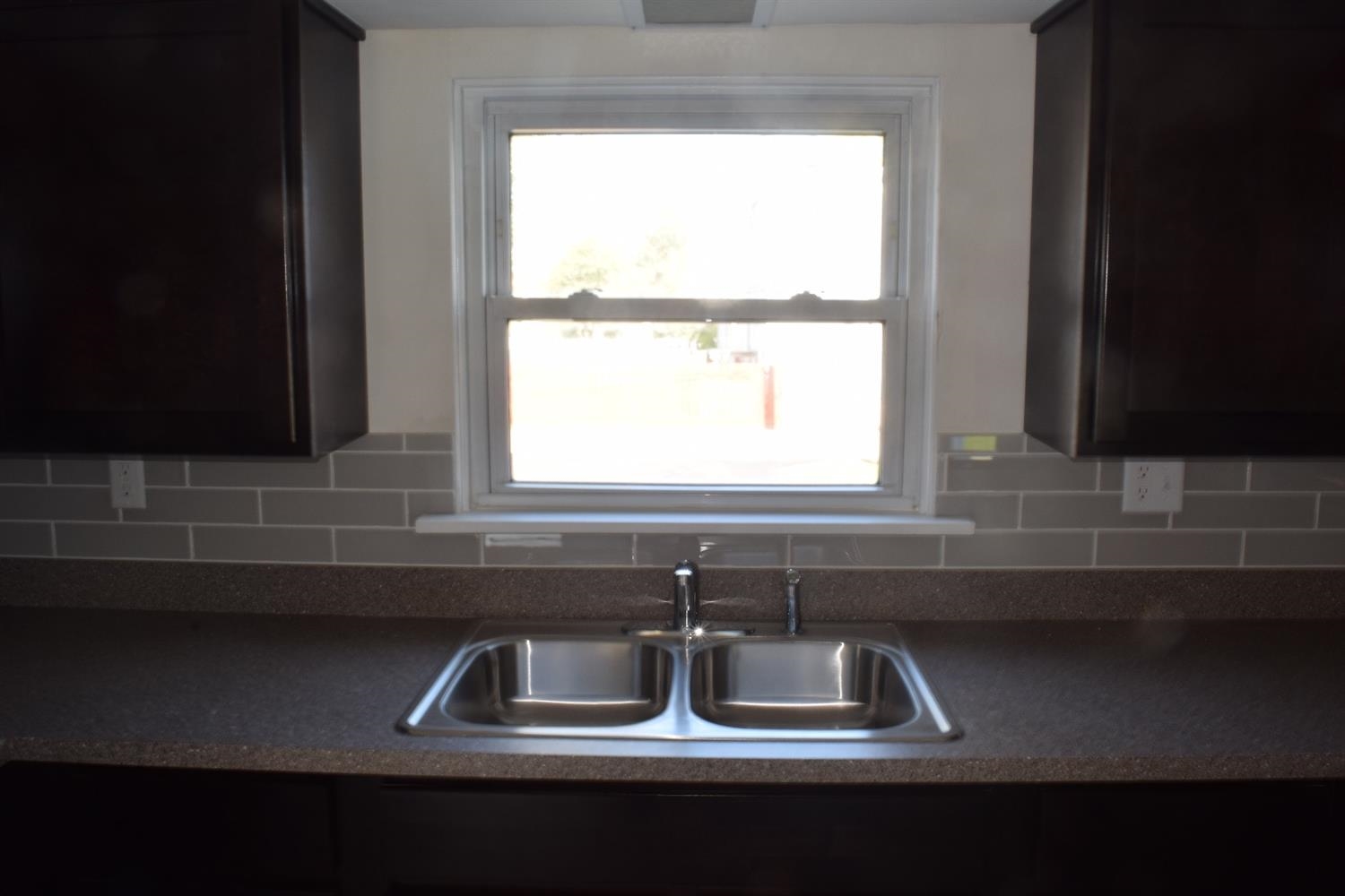 3245 Ridge Road Highland, IN 46322 - Photo 8 of 10 a kitchen with a sink and a window