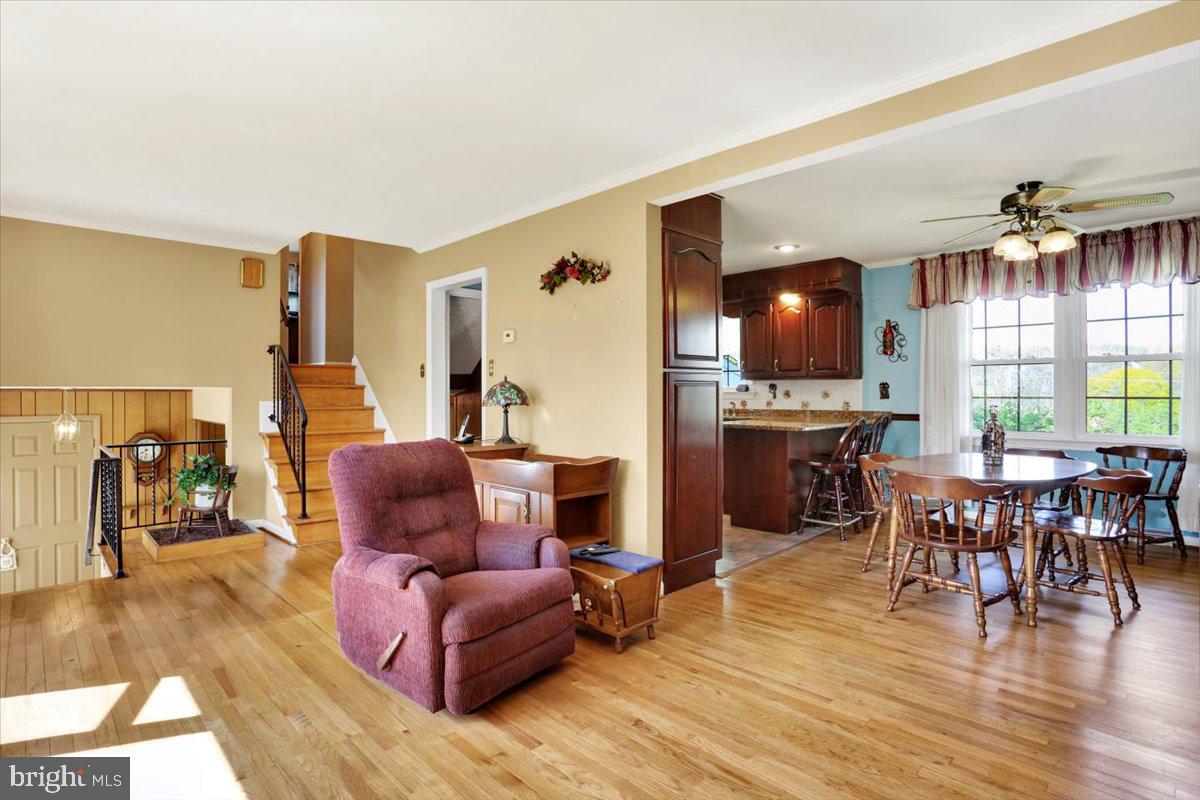 324 Ashley Drive Reading, PA 19607 - Photo 14 of 39 a living room with furniture a dining table and a large window