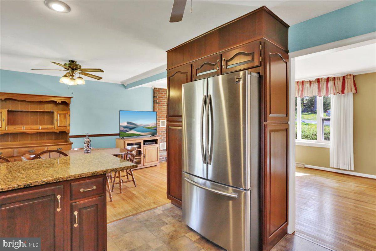 324 Ashley Drive Reading, PA 19607 - Photo 21 of 39 a kitchen with stainless steel appliances granite countertop a refrigerator a sink and a stove top oven