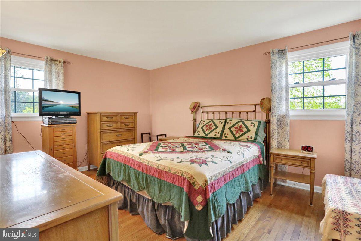 324 Ashley Drive Reading, PA 19607 - Photo 29 of 39 a bedroom with bed and a table