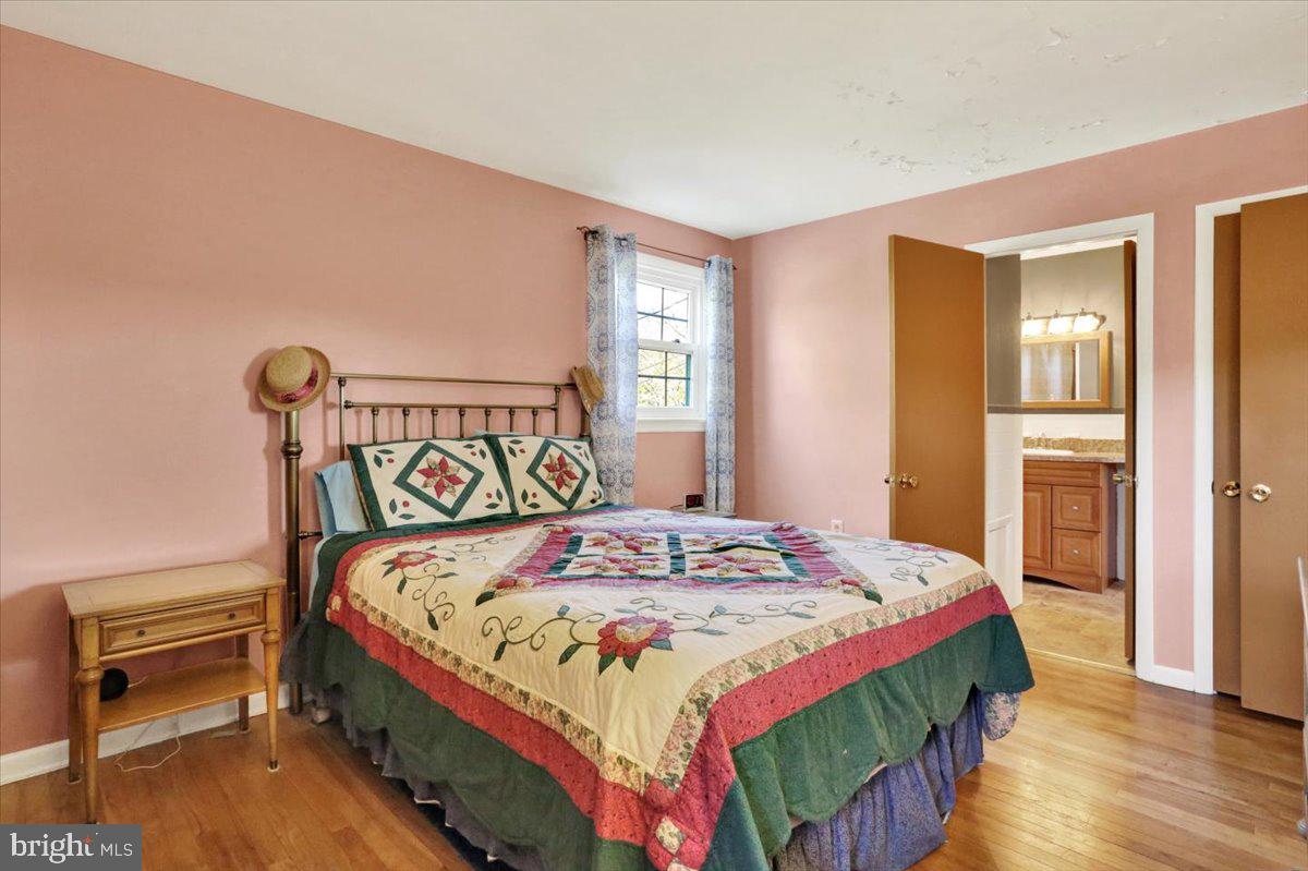 324 Ashley Drive Reading, PA 19607 - Photo 30 of 39 a bedroom with a bed and a dresser