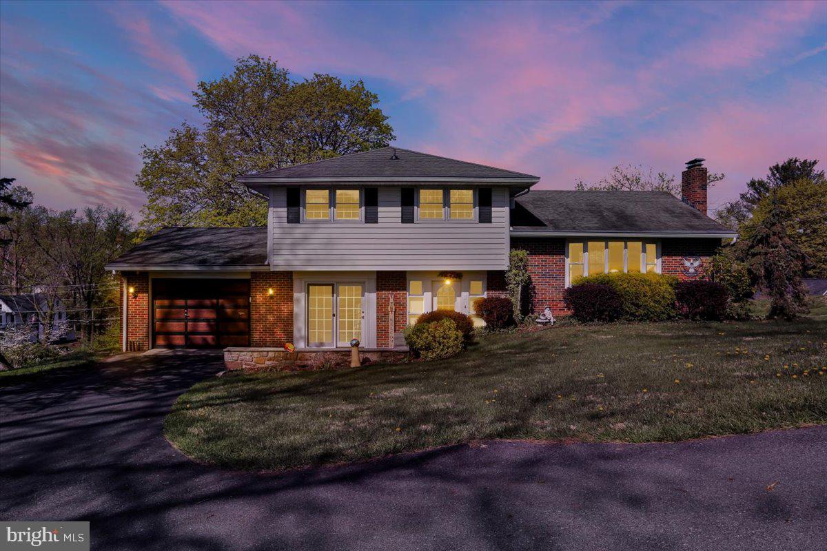 324 Ashley Drive Reading, PA 19607 - Photo 3 of 39 a front view of a house with yard
