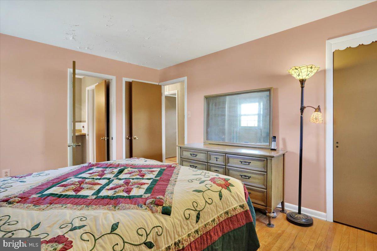 324 Ashley Drive Reading, PA 19607 - Photo 31 of 39 a bedroom with a bed and a dresser