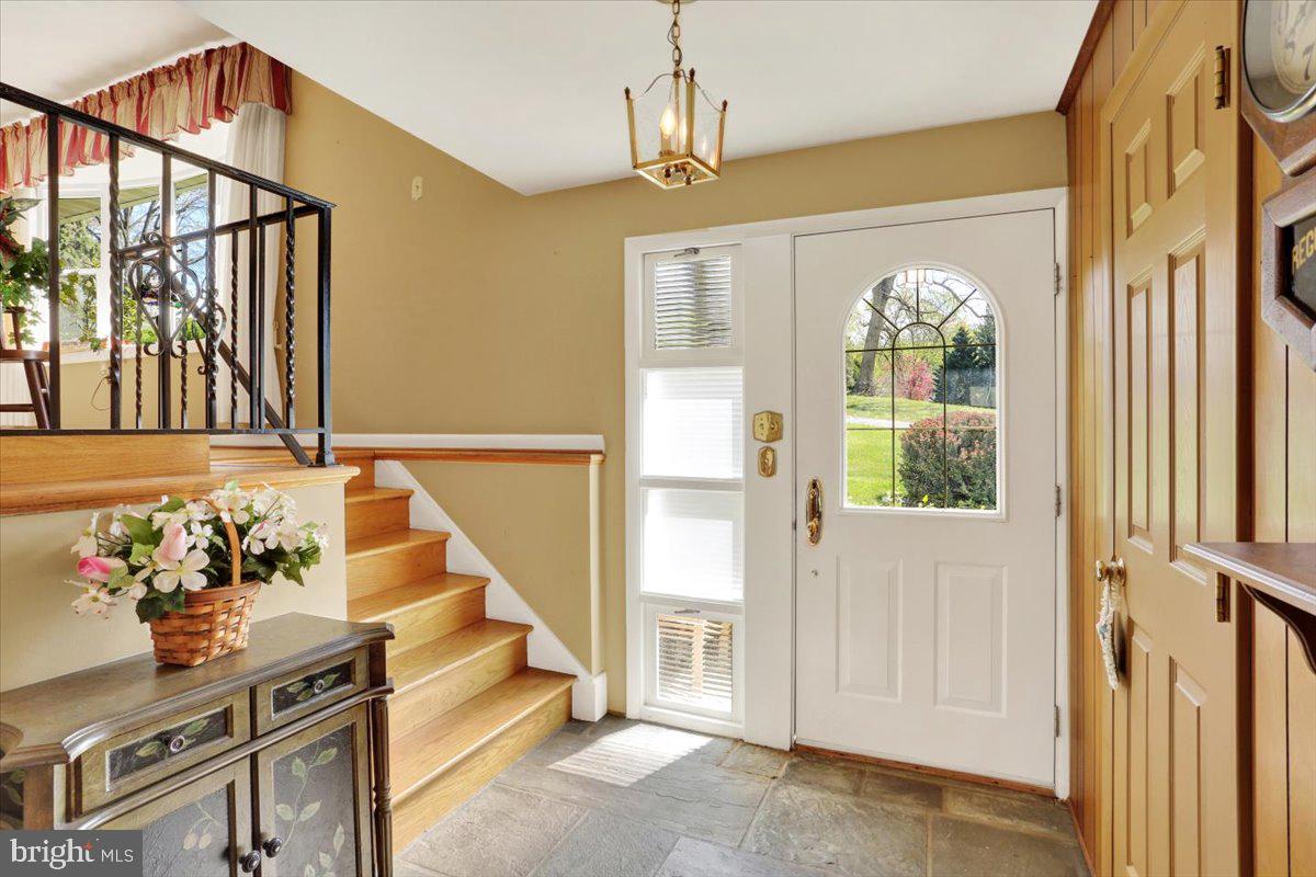 324 Ashley Drive Reading, PA 19607 - Photo 6 of 39 a view of entryway and hall with wooden floor