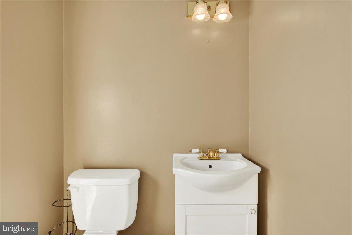 324 Ashley Drive Reading, PA 19607 - Photo 7 of 39 a bathroom with a sink and mirror