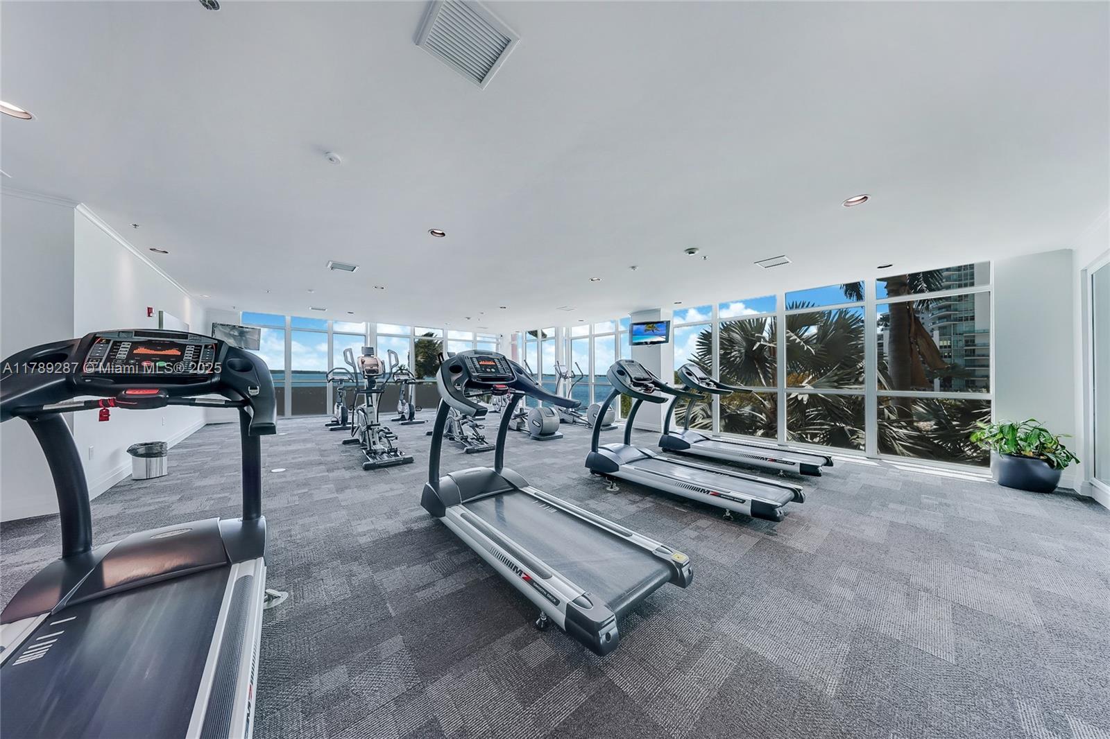 1155 Brickell Bay Drive, Unit 1210 Miami, FL 33131 - Photo 18 of 18 a view of a room with gym equipment