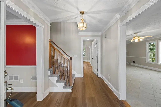 a view of a livingroom with wooden floor