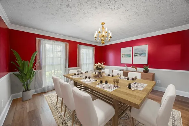 a view of a room with wooden floor and staircase