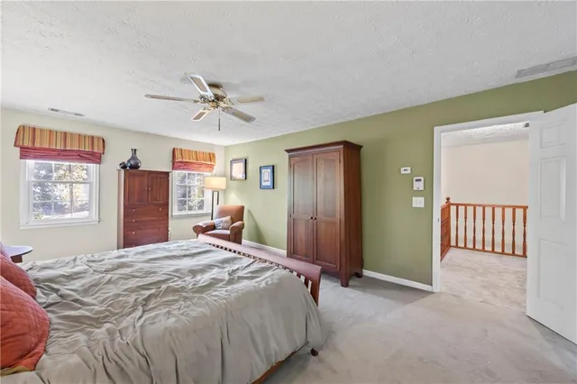 a view of a room with wooden walls